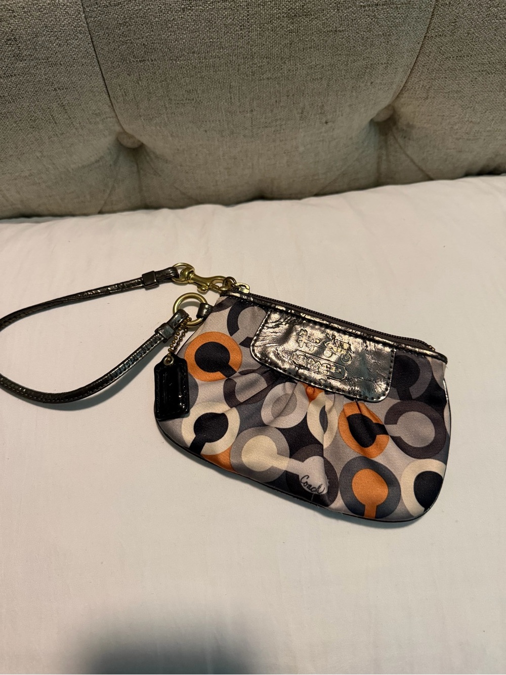 Coach Circle Print Wristlet - Black, Orange, Cream